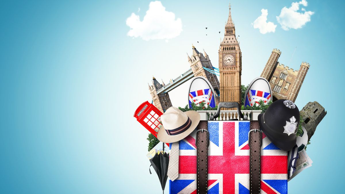 Egy bőrönd, amely tele van angliai jelképekkel, mint a Big Ben és a piros telefonfülke.